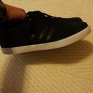 Black adidas courtesy sneakers